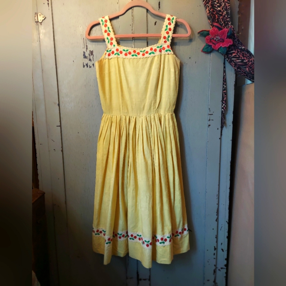 Vintage circa 1960s yellow dress with cherry trim